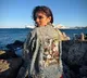 Malavika Mohanan in Greece with The Raja Saab poster dress