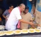 Malla Reddys Unique Election Campaign Dosa Making and Banana Selling