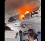 Air China Flight passenger luggage catches fire mid air in China