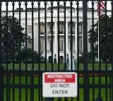Man crashes car into White House security gate, taken into custody