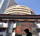 Sensex, Nifty open lower amid US-China trade tension