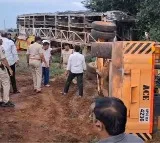 Kaveri Bus Crane Overturns While Removing Burnt Bus in Kurnool