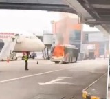 Delhi Airport Bus Catches Fire Near Air India plane