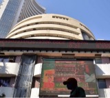 Sensex, Nifty open higher amid positive global cues