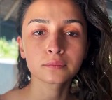 Alia Bhatt flaunts a perfect hair flip while doing her makeup