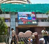 Sensex, Nifty post mild gains amid positive global cues
