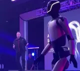 Elon Musk dances with robot after shareholders approve package