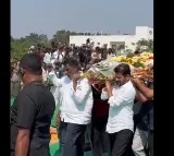 Revanth Reddy Carries Ande Sris Bier at Funeral