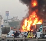 At least 8 dead, over 20 injured after car crushed between two container trucks