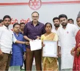 Janasena MLC Nagababu Distributes Insurance Checks to Affected Families