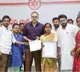 Janasena MLC Nagababu Distributes Insurance Checks to Affected Families
