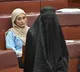 Australian Senator Pauline Hanson Suspended for Burqa Stunt