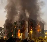 Hong Kong Fire Cigarette Butt Blamed for 128 Deaths
