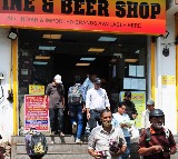 Telangana Wine Shops Open with Prayers and High Sales