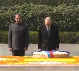 Russian President Vladimir Putin pays tribute to Mahatma Gandhi at Rajghat