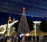Bethlehem Christmas Tree Lights Up After 2 Years Amidst Gaza Conflict