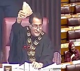 Pakistan National Assembly Speaker waves lost cash 12 MPs raise hands