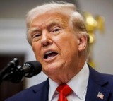 Trump signs AI order to curb state rules, warns China race at stake