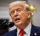 Trump signs AI order to curb state rules, warns China race at stake