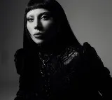 Lady Gaga hits pause on Sydney concert as dancer slips off stage