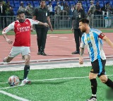 Revanth Reddy Plays Football with Messi Kiren Rijiju Criticizes