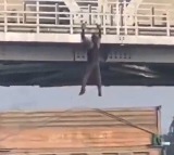 Hapur stuntman performs dangerous stunt on UP highway bridge