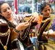 Gold rises to record high over strong safe haven demand