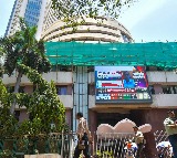 Sensex, Nifty trade flat amid consolidation phase