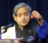 Shashi Tharoor Responds to Digvijay Singhs Photo of Modi at Advanis Feet