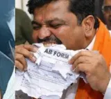 Uddhav Kamble Shiv Sena Candidate Eats Nomination Papers Case Filed