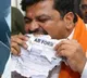 Uddhav Kamble Shiv Sena Candidate Eats Nomination Papers Case Filed