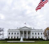 White House warns Iran, cites military action