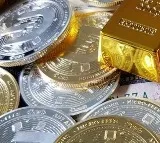 Gold, silver prices ease amid profit booking at record levels