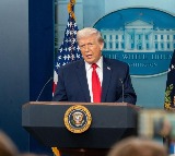 Trump defends tariffs, floats $2,000 dividend