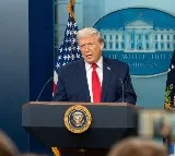 Trump defends tariffs, floats $2,000 dividend