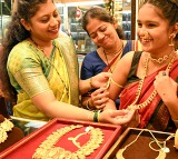 Gold prices jump over 4 pc to hit record high