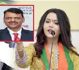 Amruta Fadnavis Slams Sanjay Rauts Criticism of Devendra Fadnavis Davos Visit