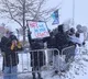 About 100 clergy arrested at Minneapolis airport in anti-ICE protest