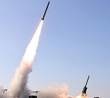 North Korea test-fires large-caliber multiple rocket launcher with Kim in attendance