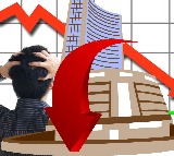 Sensex, Nifty end lower weighed down by metal, IT stocks