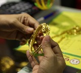 Gold, silver prices slip amid profit booking, dollar gains
