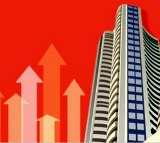 Sensex, Nifty trade higher over sustained foreign inflows