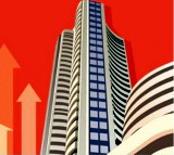 Sensex, Nifty trade higher over sustained foreign inflows