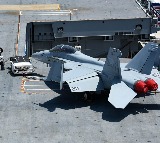 US Military Moves Warships Aircraft to Middle East Amid Iran Talks