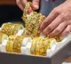 Gold, silver continue to trade within consolidation band amid mild profit booking