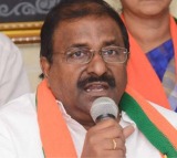 YSRCP members rush towards Somu Veerraju in Legislative Council