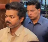 Vijay attending Kalpathi Suresh's son's wedding reception with Trisha divides Internet