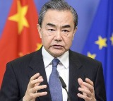 Wang Yi says India China should not see each other as threats