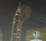UAE air defences intercept Iranian missiles, debris hits tower in Dubai Marina