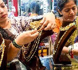 Silver dips 1.30 pc, gold eases marginally over stronger dollar